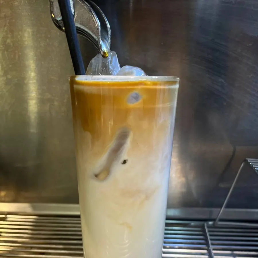 Iced coffee latte being prepared